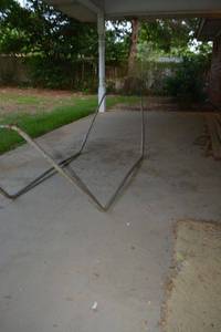 lot 270 image: Metal Hammock Frame and outdoor planter pots