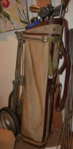 lot 214 image: Vintage golf club set with rolling cart