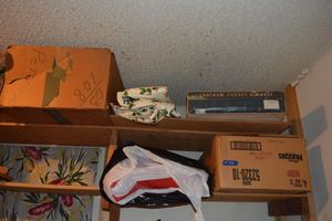 lot 213 image: Christmas tablecloths, Santa hats, decorations