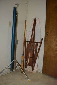 lot 201 image: Vintage slide projector screen, wooden ironing board and broom