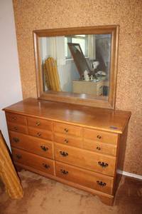 lot 144 image: Dresser with mirror. Dresser measures 49.5x18.5x32H and mirror measures 37x31