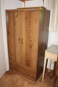 lot 148 image: Wardrobe cabinet - 33x24x63 -  plus disposable plates, napkins, and cups