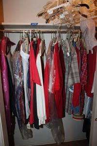 lot 166 image: Clothes and storage bag in closet, see photos