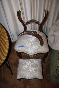 lot 179 image: Upholstered traditional side chair with matching foot stool (chair needs re-gluedrepair)