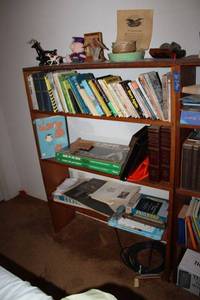 lot 182 image: Contents only of bookshelf Figurines, Games, puzzles, books and more