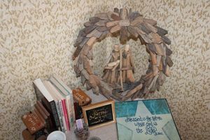lot 2 image: Home dcor candle wall sconces, Ten Commandments print, wood wreath, books and more