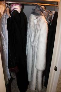 lot 3 image: Coat closet contents faux fur coats and dressy clothes