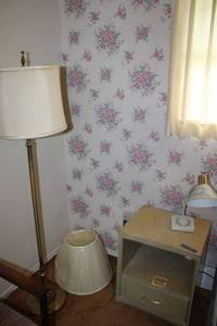 lot 35 image: Blonde Bedside table (matches lots 33, 128, 146), vintage desk lamp, floor lamp and extra lamp shade