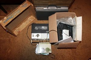 lot 50 image: Vintage briefcase, Panasonic reel-to-reel player, and wooden fruit crate