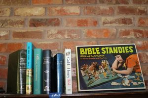lot 62 image: Childrens Bibles and Bible story books with Unused Bible Standies Play tray figurines