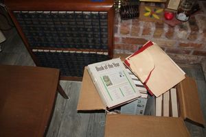 lot 66 image: Britannica Books of the Year from 1965 to 1973 and Encyclopedia set dated 1954 including book shelf