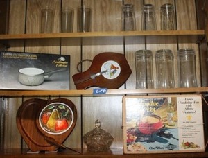 lot 84 image: Vintage cheese cutting boards, Fondu pot, 1 Qu. Saucepan, and clear glass tumblers.