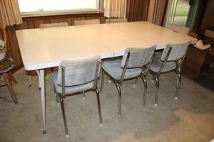 lot 98 image: Mid-century gold speckled dining table and grey upholstered chairs