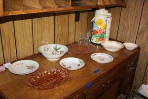 lot 106 image: Vintage serving bowls and pink depression glass platters, crystal candy dishes, insulated drink dispenser
