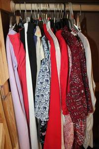 lot 136 image: Clothes closet items clothes, belts and closet organizer