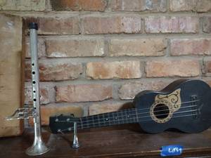 lot 64 image: Ukulele plus metal recorder with music clip