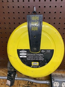 lot 151 image: Automatic roll up shop extension cord
