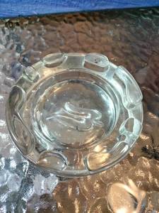 lot 81 image: Thick Glass Ashtray with Dove Cutout