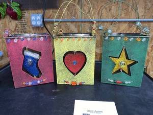 lot 134 image: Metal candle holders