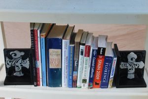 lot 43 image: Travel Books as shown and Decorative Book Ends