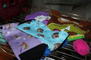 lot 50 image: Children Hats and Socks as shown