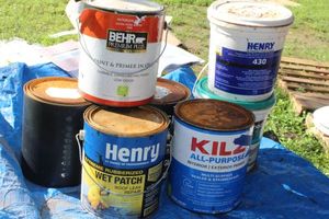 lot 110 image: Paints and Adhesive Gallon Cans, More than half full