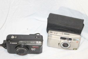 lot 154 image: Cannon Sure Shot and Olympus 35 mm Film Cameras
