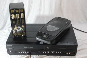 lot 166 image: Maytag DVDVHS Combo, VHS Tape Rewinder and Starwars VHS Movies SIP