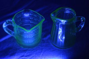 lot 214 image: Uranium Glass Creamer Glasses