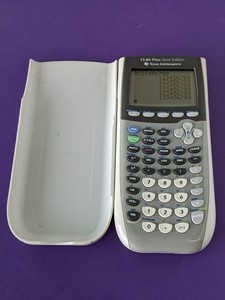 lot 25 image: Texas Instruments TI- Graphing Calculator TI-84 Plus Silver Edition