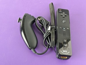 lot 44 image: Nintendo Wii MotionPlus INSIDE Controller w Nun-Chuck