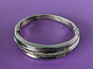 lot 100 image: Sterling Silver Closed Bracelet - 29.3grams