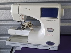 lot 123 image: Janome Memory Craft 9000 sewing, quilting and embroidery machine