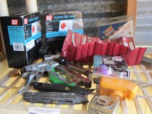 lot 45 image: 2 boxes of plastic cap nails - staple gun- BOX CUTTERS  and measuring tapes