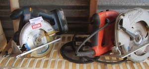 lot 61 image: Ryobi saw battery operated - electric Milwaukee saw