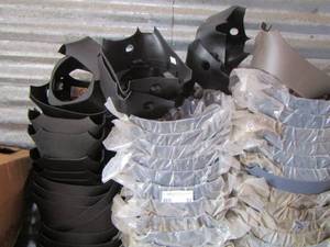 lot 82 image: Black and grey horn covers qty 20 plus