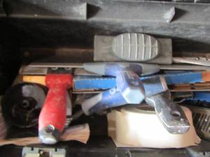 lot 83 image: Black and yellow tool box with scrappers- sheet rock tape and more