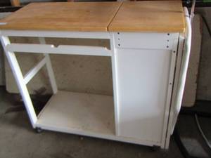 lot 115 image: Single door drawer with fold down ironing board - washroom rolling cabinet, 364119