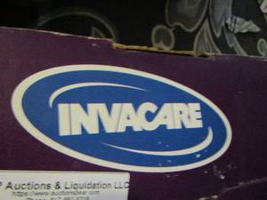 lot 190 image: Invacare raise toilet seat in box