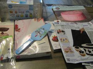 lot 191 image: baking lot includes sugar sheets, candy mold pack, candy mold dessert decorator and more