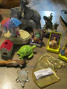 lot 202 image: Luckily , Mondays only happen once a week    Winnie the pooh,    Turtle Ttrinket, qty 3    Im a hug factory figurines, and more