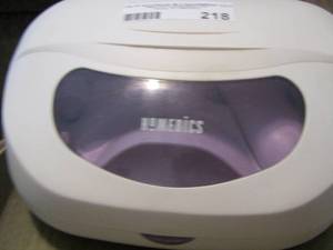 lot 218 image: Homedics nail dremel in case
