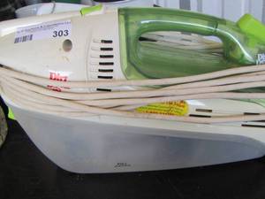 lot 303 image: mini dirt devil vacuum