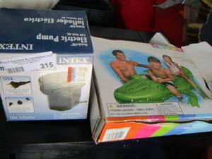 lot 315 image: Intex ride on inflatable water gator, used air pump