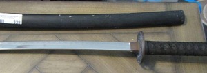 lot 328 image: KATANA SWORD Black handled  32 blade , with total length is  41  very sharp nice