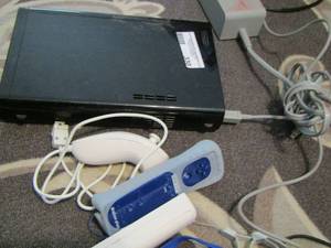 lot 330 image: WII    2 controllers and a power cord, game controller