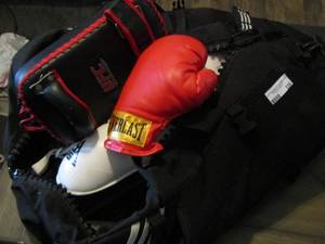 lot 336 image: Black boxing bag with gloves hand pad plus much more