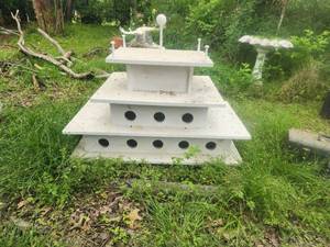 lot 235 image: Large wooden birdhouse - 30 tall x 40 long x 21 deep