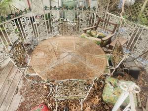lot 216 image: Wrought iron 48 table and 4 chairs