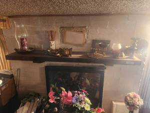 lot 197 image: Contents of fireplace and mantle area